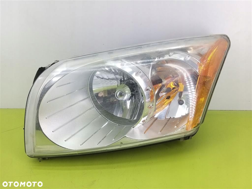 Reflektor lampa przód lewa Dodge Caliber 2006-2009 PRZED LIFT - 1