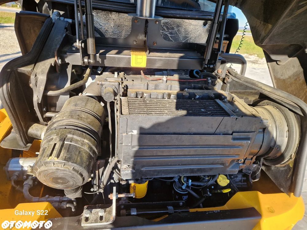 JCB 406 - 5