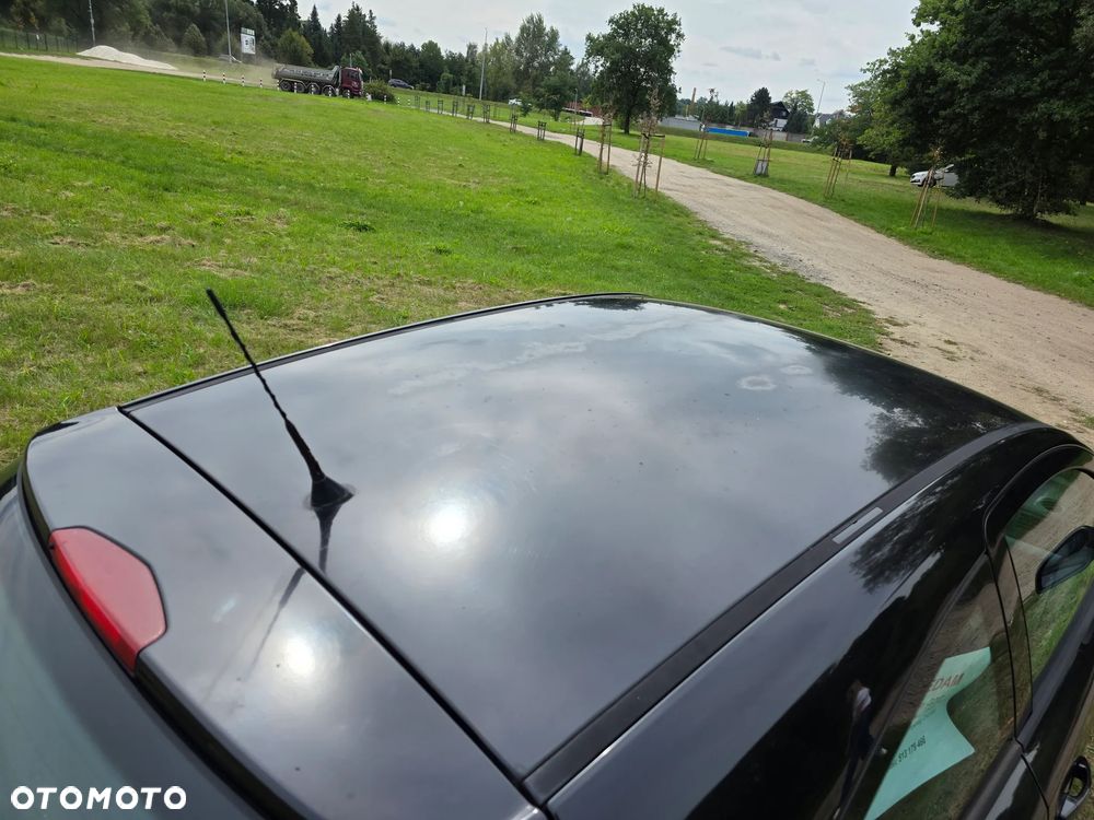 Opel Astra 1.6 Cosmo - 9