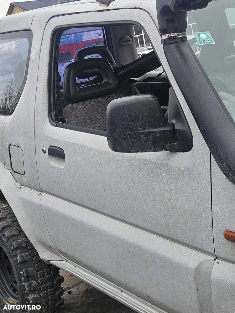 Usa dezechipata stanga/dreapta fata Suzuki Jimny 2003 - 1