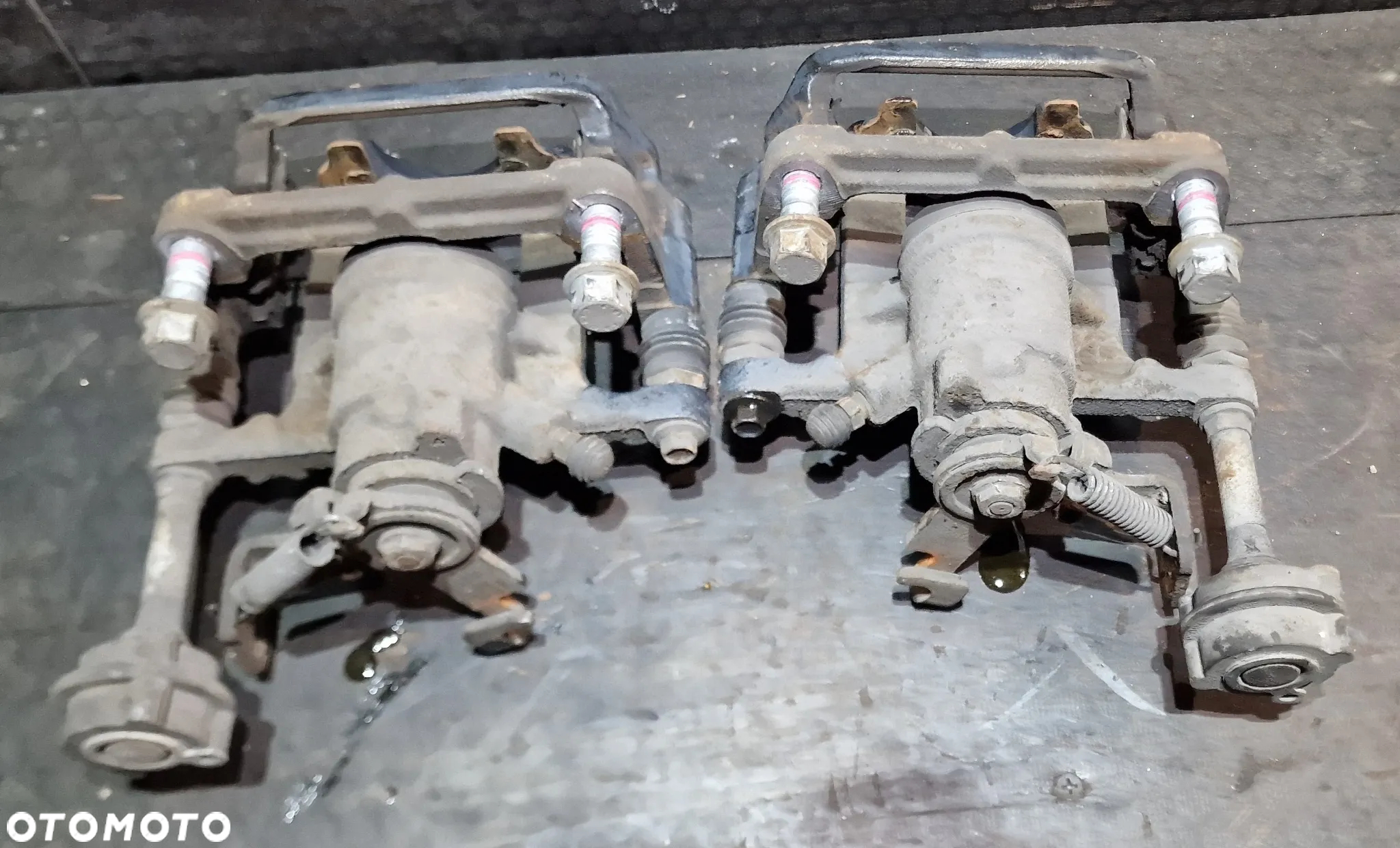 ZACISK HAMULCOWY TYŁ PRAWY LEWY 13467355 13467356 OPEL ASTRA IV J GTC OPC 1.6 T - 9