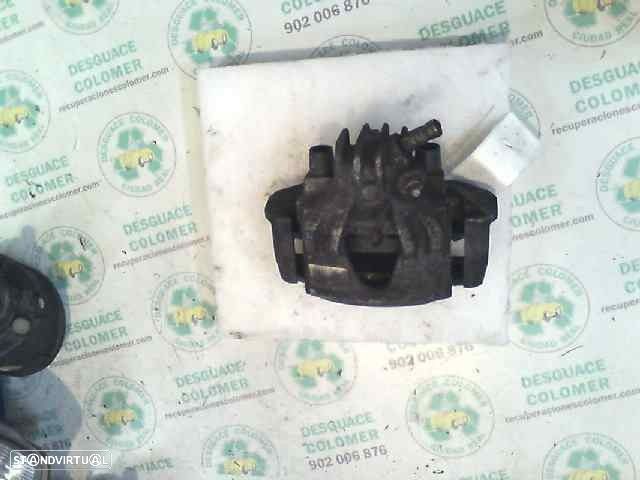 PINÇA DE TRAVÃO FRENTE ESQUERDA - 1