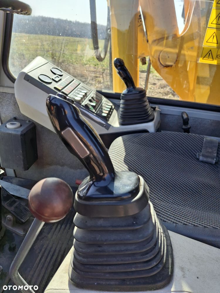 Liebherr A312 CAT JCB - 10