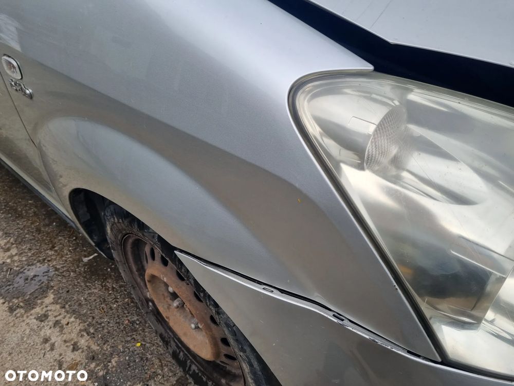 TOYOTA COROLLA VERSO II 04-07 2004 r. 1C0 błotnik prawy przód PP * - 10