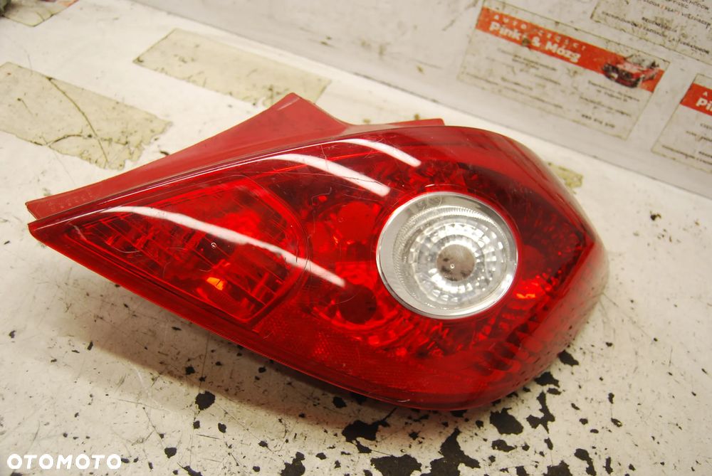 LAMPA PRAWY TYŁ TYLNA PRAWA 89316518 OPEL CORSA D - 1