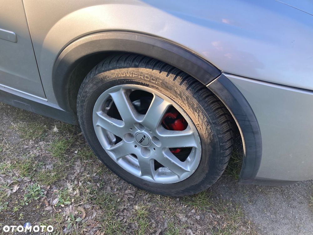 Opel Corsa 1.2 16V Cosmo - 11