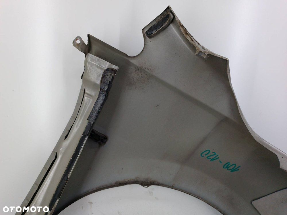 BŁOTNIK LEWY PRZÓD NISSAN TIIDA K32 - 12