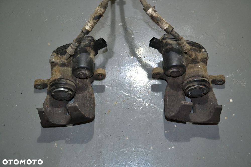 AUDI A6 C7 A7 3,0 TDI QUATTRO ZACISK HAMULCA TYŁ TYLNY ELEKTRYCZNY - 1