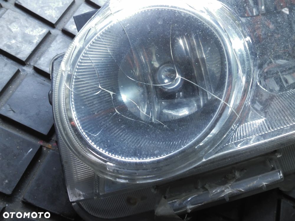 REFLEKTOR LEWY LAMPA PRZÓD NISSAN X-TRAIL 2 II - 2