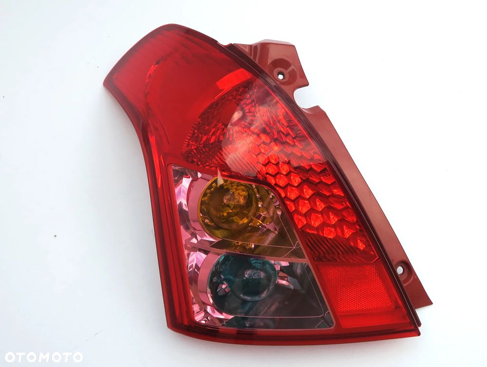 SUZUKI SWIFT 3 III Lift 2008 - 2010 Lampa tył lewa L ORYGINAŁ OE - 9
