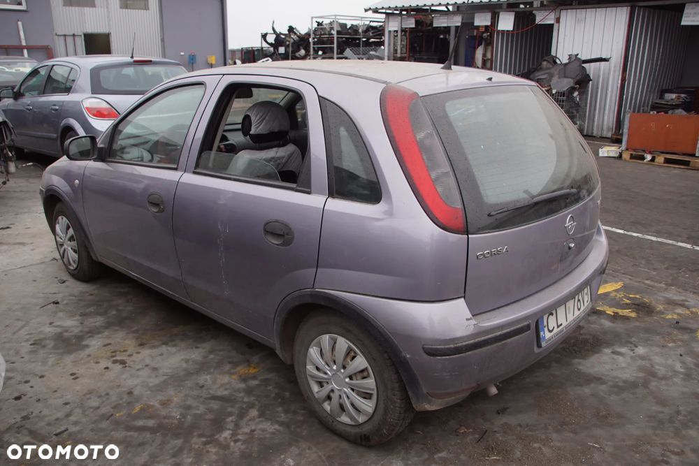Auto na części - Opel Corsa C Lift 1.2 80 KM Z12XEP F13 4OU 2004R Silnik Skrzynia Drzwi Maska Błotnik Klapa Zderzak Lusterko Lampa Klamka Szyba Deska Kokpit Sterownik Moduł Czujnik Licznik Panel Wyświetlacz Kierownica - 6