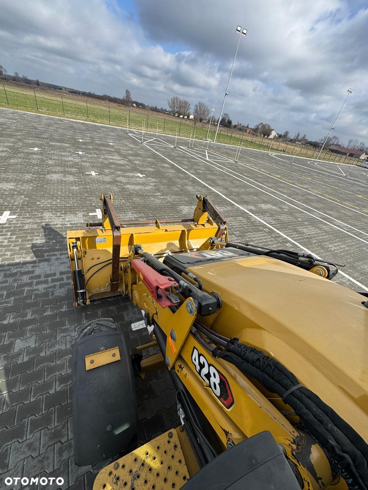 Caterpillar 428 - 10