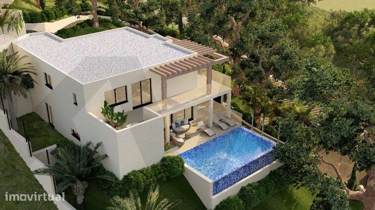 Moradia T5 unifamiliar de arquitetura contemporânea c/ piscina aquecid - Grande imagem: 2/60