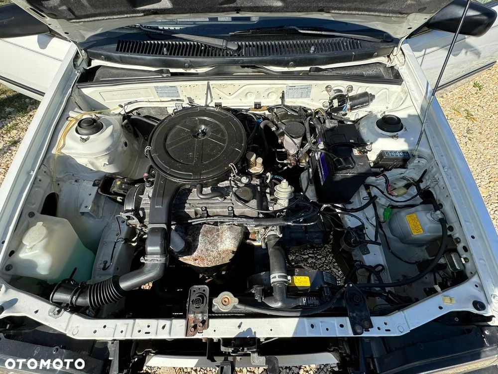 Mazda 323 1.3 LX - 4