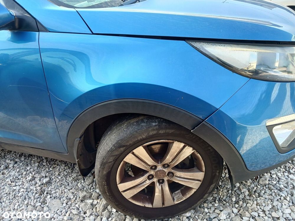 BŁOTNIK PRAWY PRZÓD KIA SPORTAGE III 5B 2011 ROK - 1