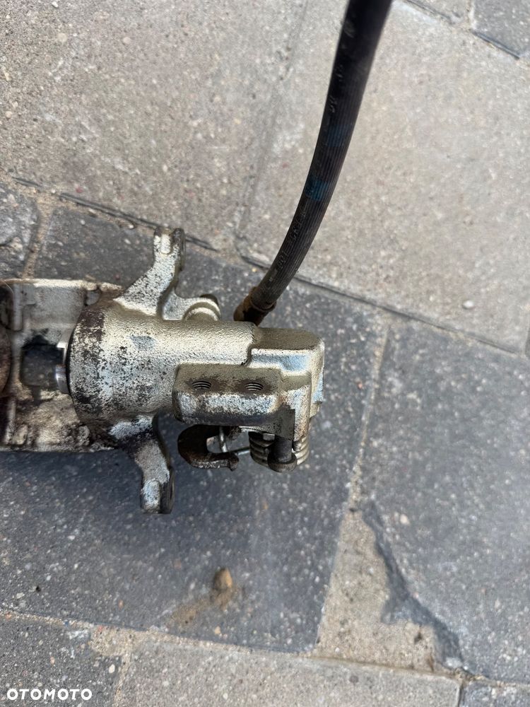 ZACISK PRAWY TYŁ HONDA JAZZ 02-08 JAK NOWY - 5