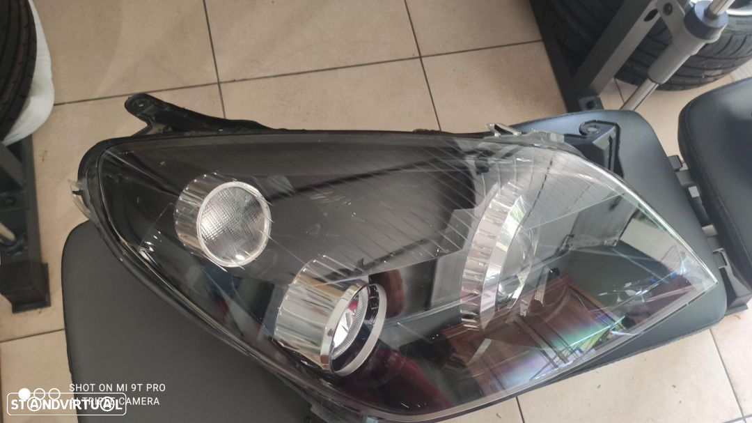 farol direito xenon Astra H - 3