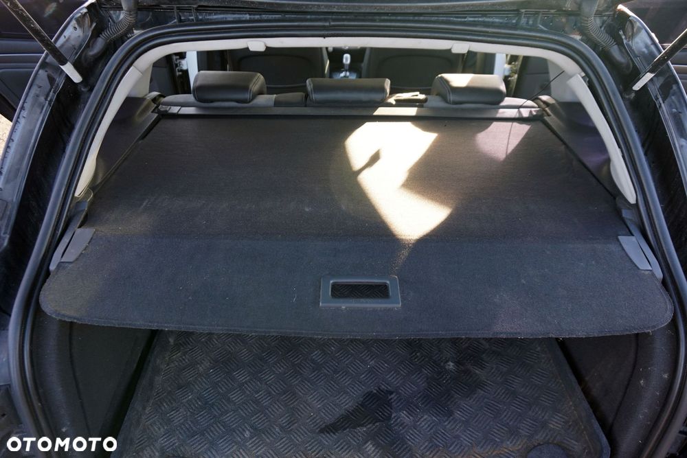 ROLETA BAGAŻNIKA LAGUNA III PH1 KOMBI  RENAULT 2007-2012 - 1