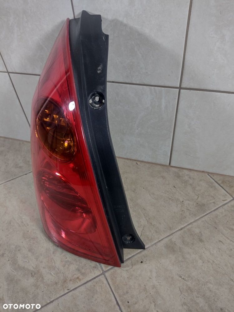 Nissan Primera P12 kombi lampa tył lewa oryginał kompletna wysyłka - 5