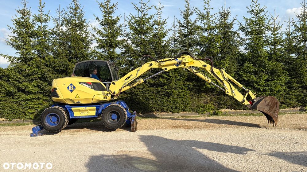 Mecalac Koparka 14 ton MECALAC 15 MWR koparko-ładowarka 3 łyżki widły 1 wł Centr.smarowanie Opony na BLIŹNIAKU 80%Camso ładowarka 714 12MTX 4x4 skrętne KLIMA kabina Premium silnik 146KM volvo EW140B DEUTZ szybka 35km/h - 28