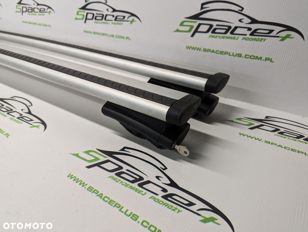 Bagażnik dachowy bazowy na otwarte relingi Thule 775 wingbar 118cm z napisem Renault. - 1