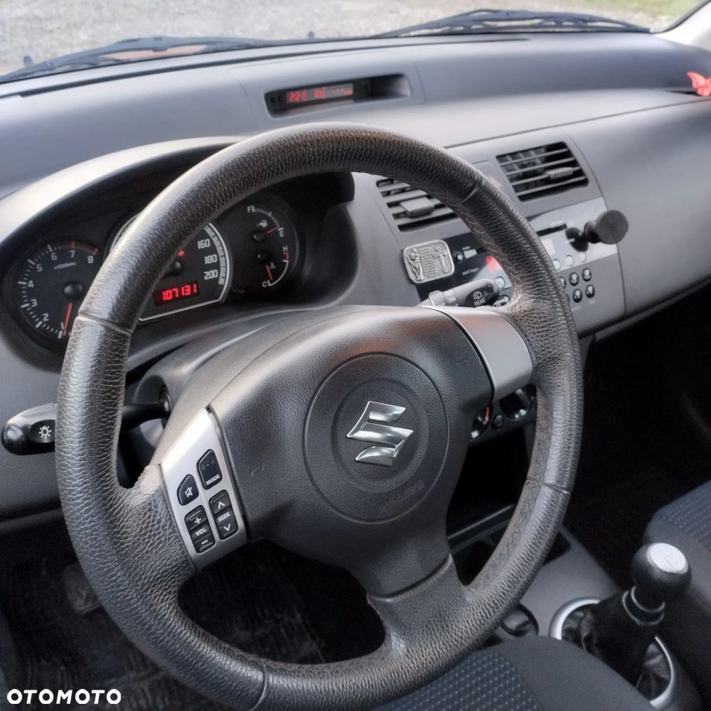 Suzuki Swift 1.3 Sakura - 8