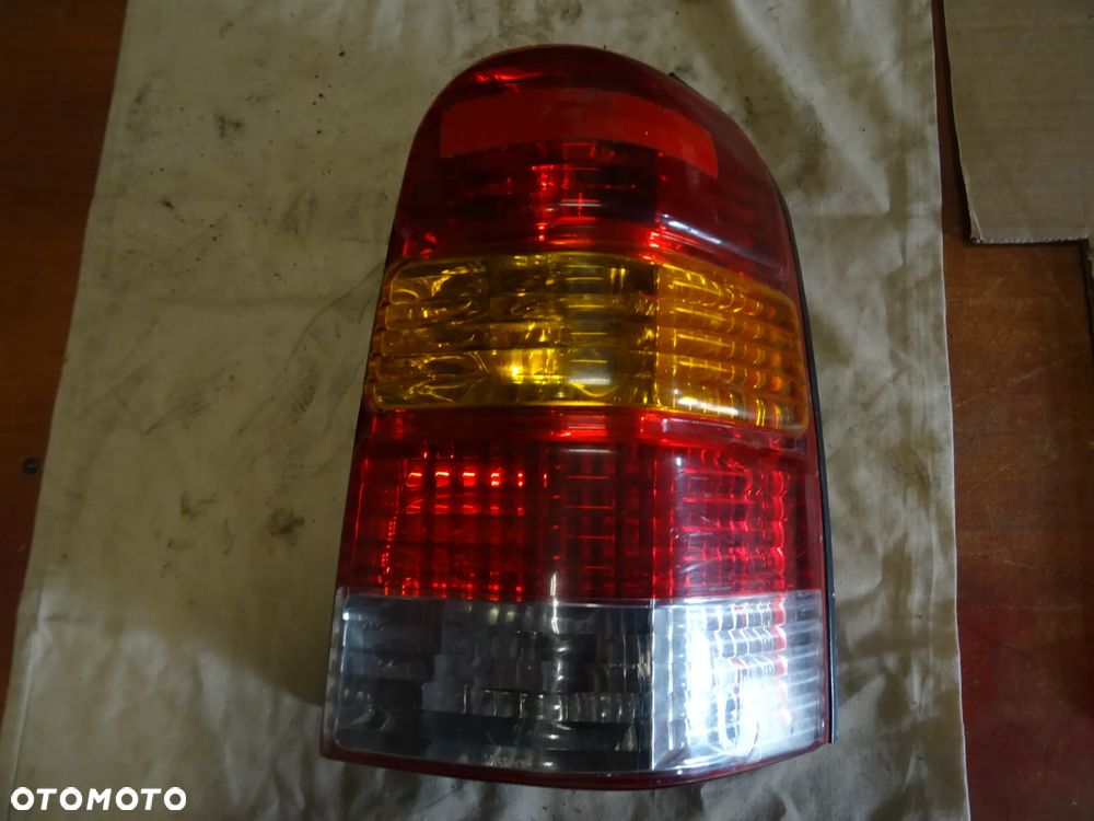 FORD MAVERICK LAMPA PRAWA TYL TANIO CZESCI ROZNE PYTAC