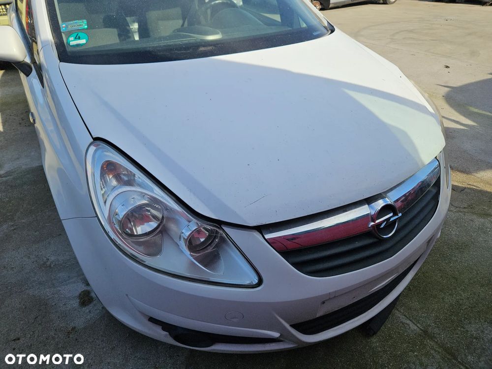 Maska Opel Corsa D 2009r Y474 3d hatchback - 1