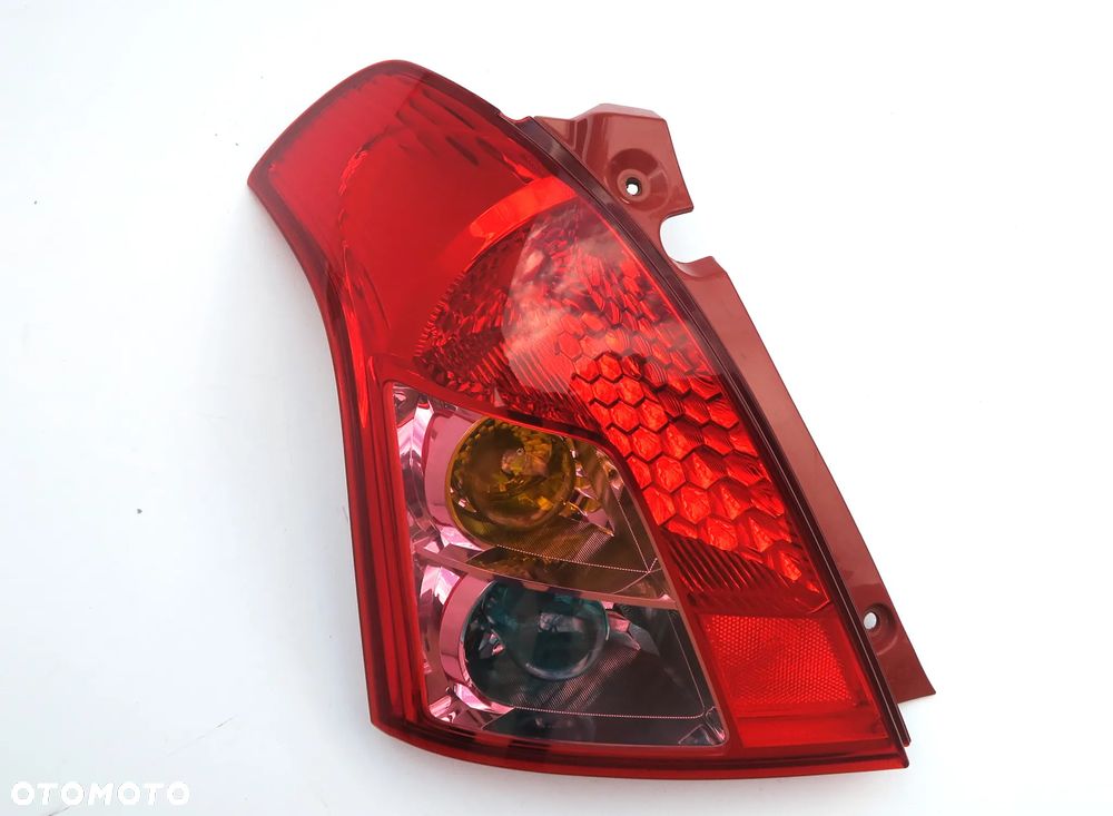 SUZUKI SWIFT 3 III Lift 2008 - 2010 Lampa tył lewa L ORYGINAŁ OE - 1