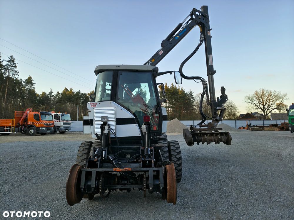 Caterpillar UNAC 300RR Mulczer kolejowy Liebherr atlas dwudrogowy zw - 12