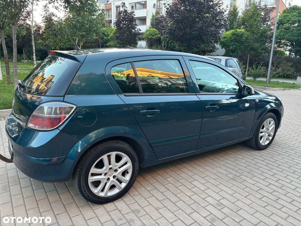 Opel Astra 1.6 Cosmo - 12