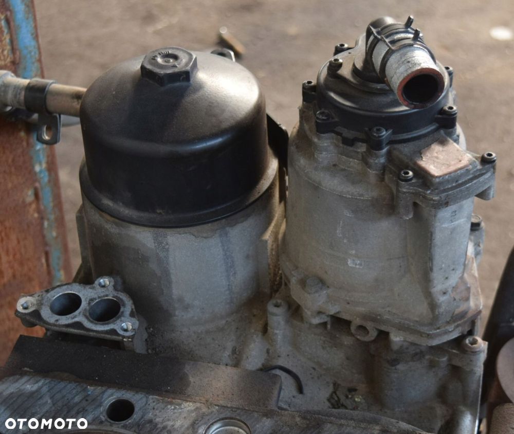 PODSTAWA FILTRA OLEJU MAN TGX TGS E6 D20 D26 - 3