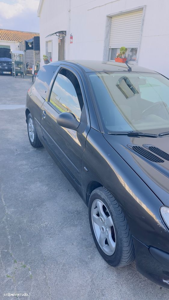 Peugeot 206 ver-hdi-90-premium - 8