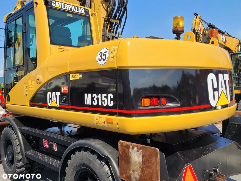 Caterpillar M315C / ROTOTILT ze szczypcami / ZADBANY EGZEMPLARZ / - 7