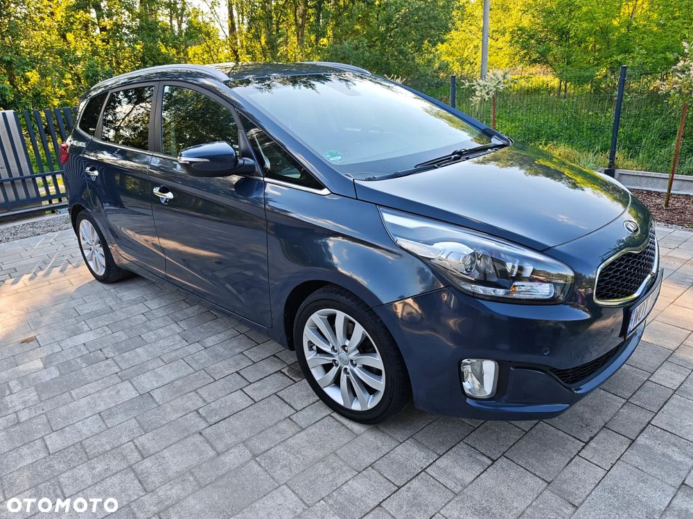 Kia Carens - 4