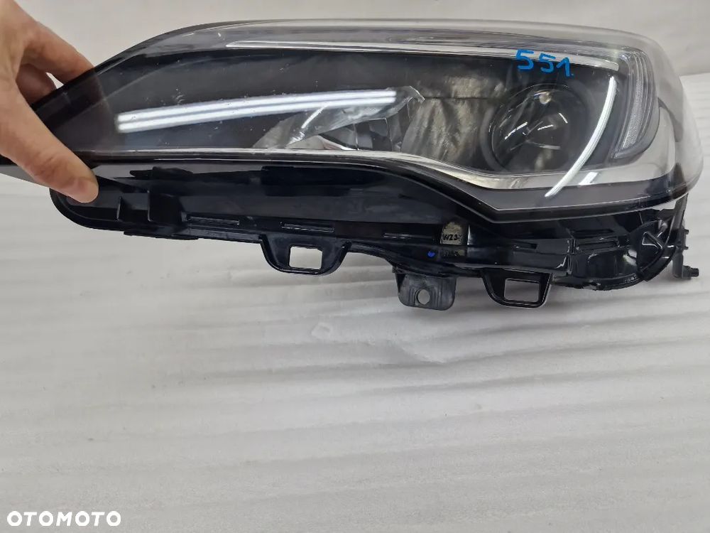 OPEL ASTRA V K 5 15- LEWA SOCZEWKA ZWYKŁA NR 39077800 , NR AUKCJI LL551 - 10