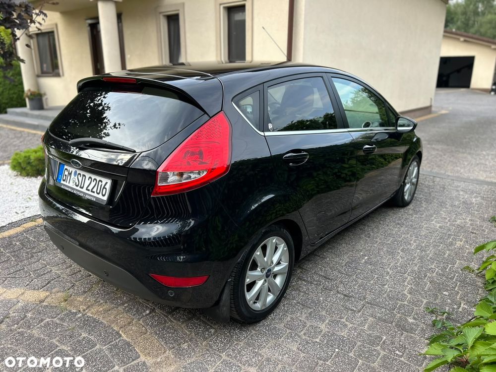Ford Fiesta 1.4 Ghia - 12