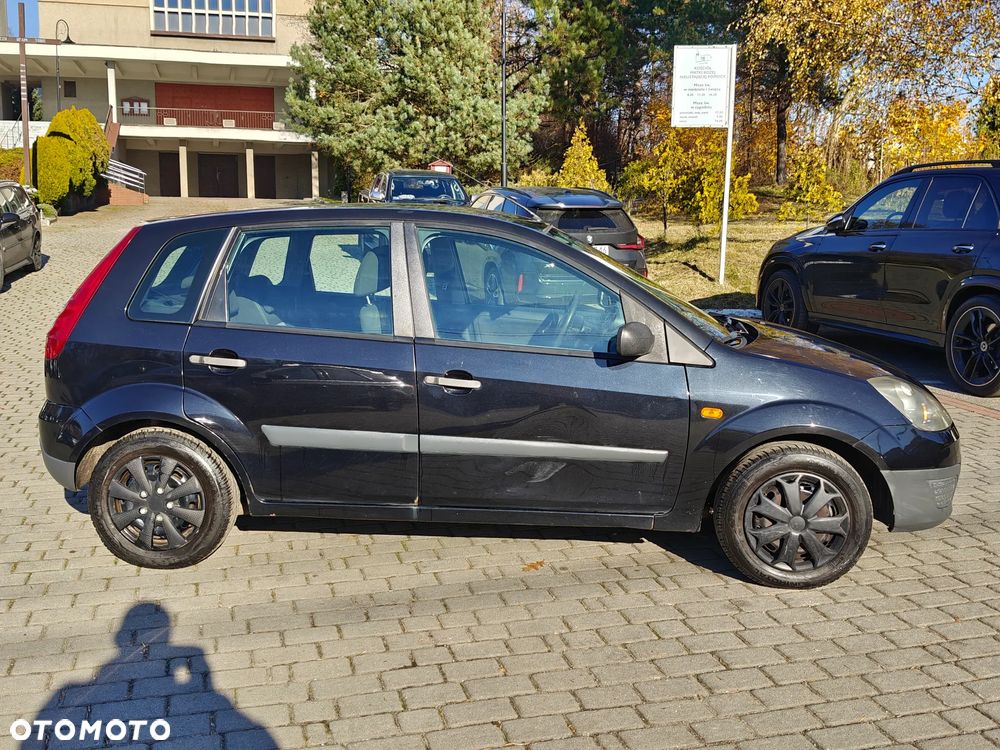 Ford Fiesta 1.3 Ghia - 4