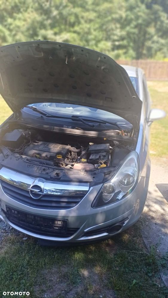 Opel Corsa 1.4 16V Cosmo - 9