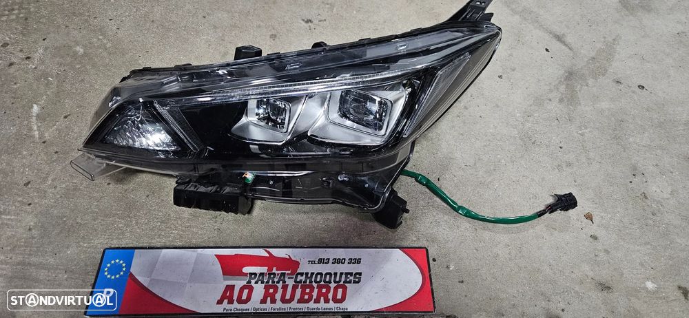 Farol esq nissan leaf - 1