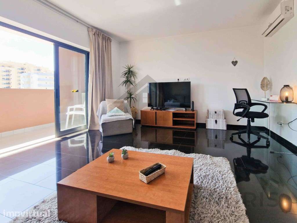 Apartamento T1 com Piscina e Vista Mar para venda na Praia da Rocha - Grande imagem: 3/24