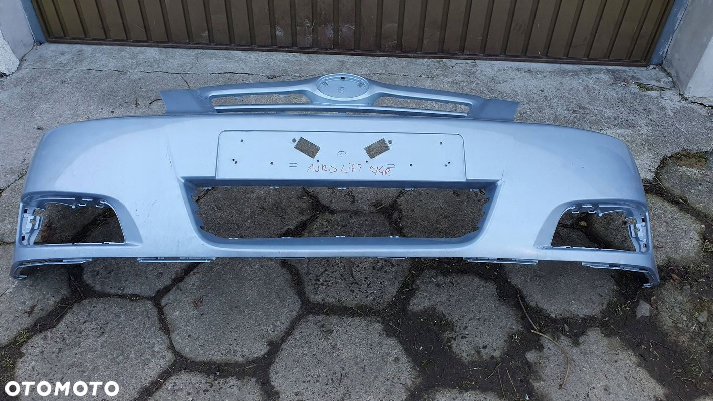 Toyota Corolla E12 04- zderzak przedni przód € - 4