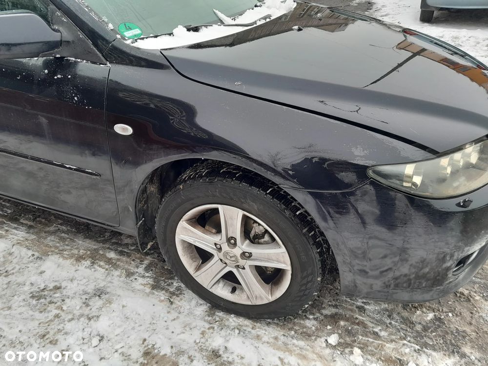 Błotnik przedni prawy MAZDA 6 GG lift 05-07r. 16W - 1
