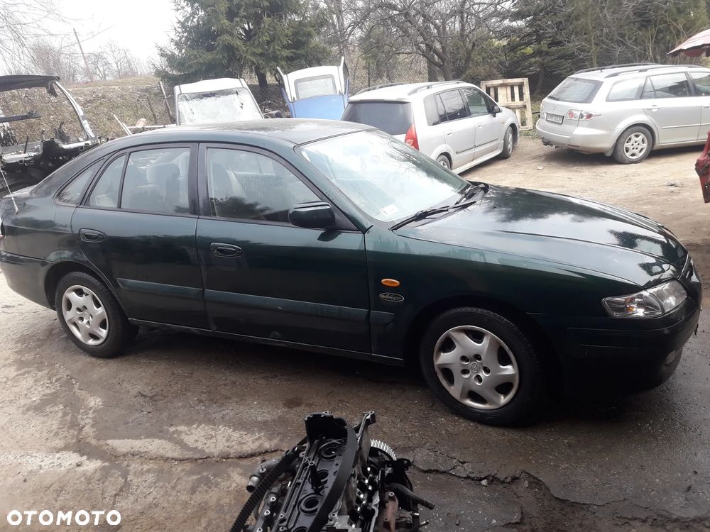 Mazda 626 GF GW 97-02 LIFT    Maska lampa zderzak pas atrapa 18J - 4