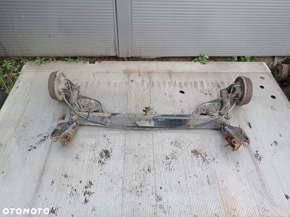 BELKA OŚ ZAWIESZENIA TYŁ NISSAN MICRA K12 HB 5D - 1