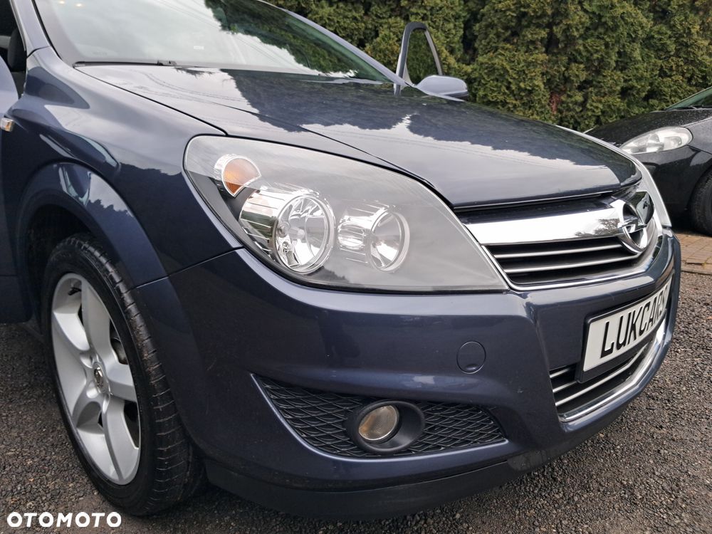 Opel Astra 1.8 Sport - 11