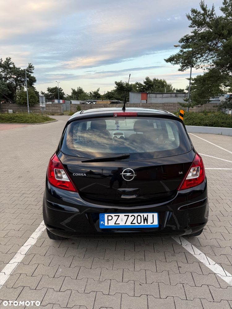 Opel Corsa 1.4 16V Cosmo - 5