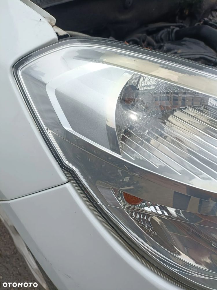 DACIA DOKKER 12-17 2013 r. lampa prawy przód prawa przednia PP EU * - 7