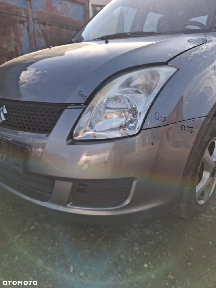 Suzuki Swift 05 zderzak przod ZCD - 5