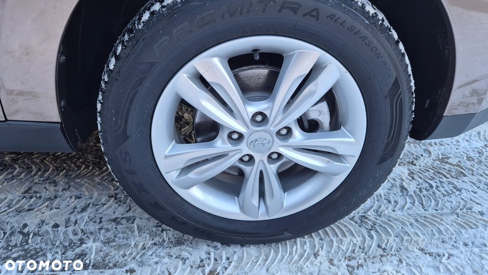 Hyundai ix35 1.7 CRDi 2WD blue Finale Gold - 16